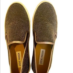 Glitzy Steve Madden size 7 slip on sneakers. Black with black crystal studs